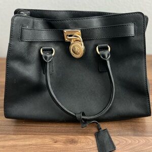 Michael Kors Black Satchel with Gold Accents